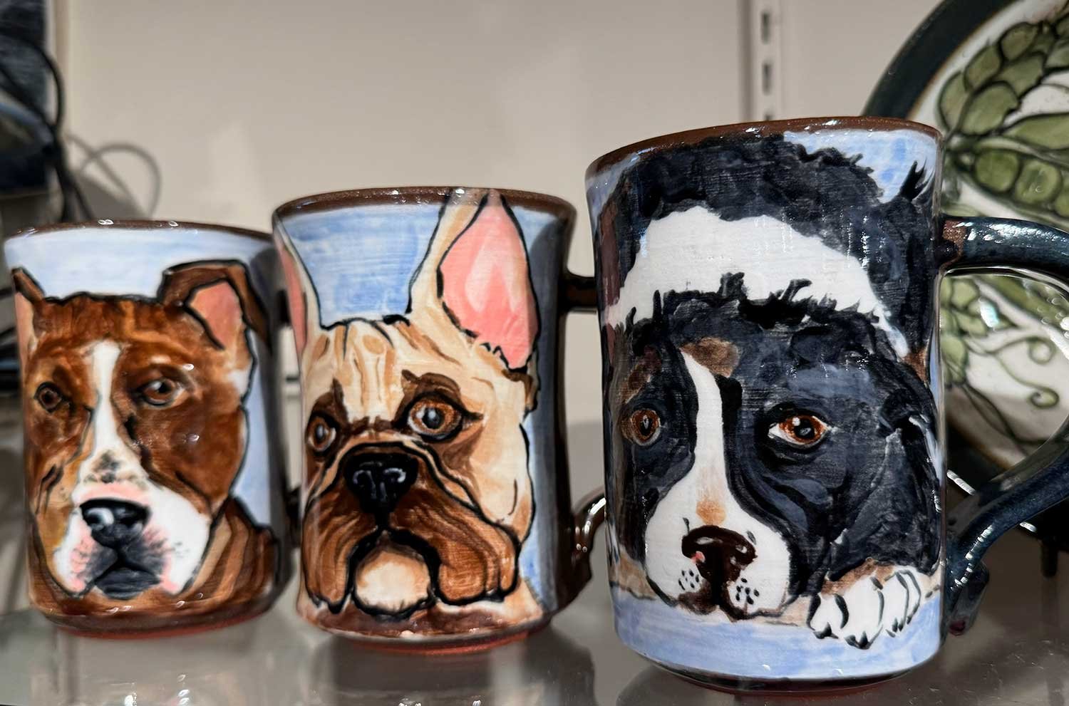 Wheel thrown, hand painted pottery by Lauren Peterson.