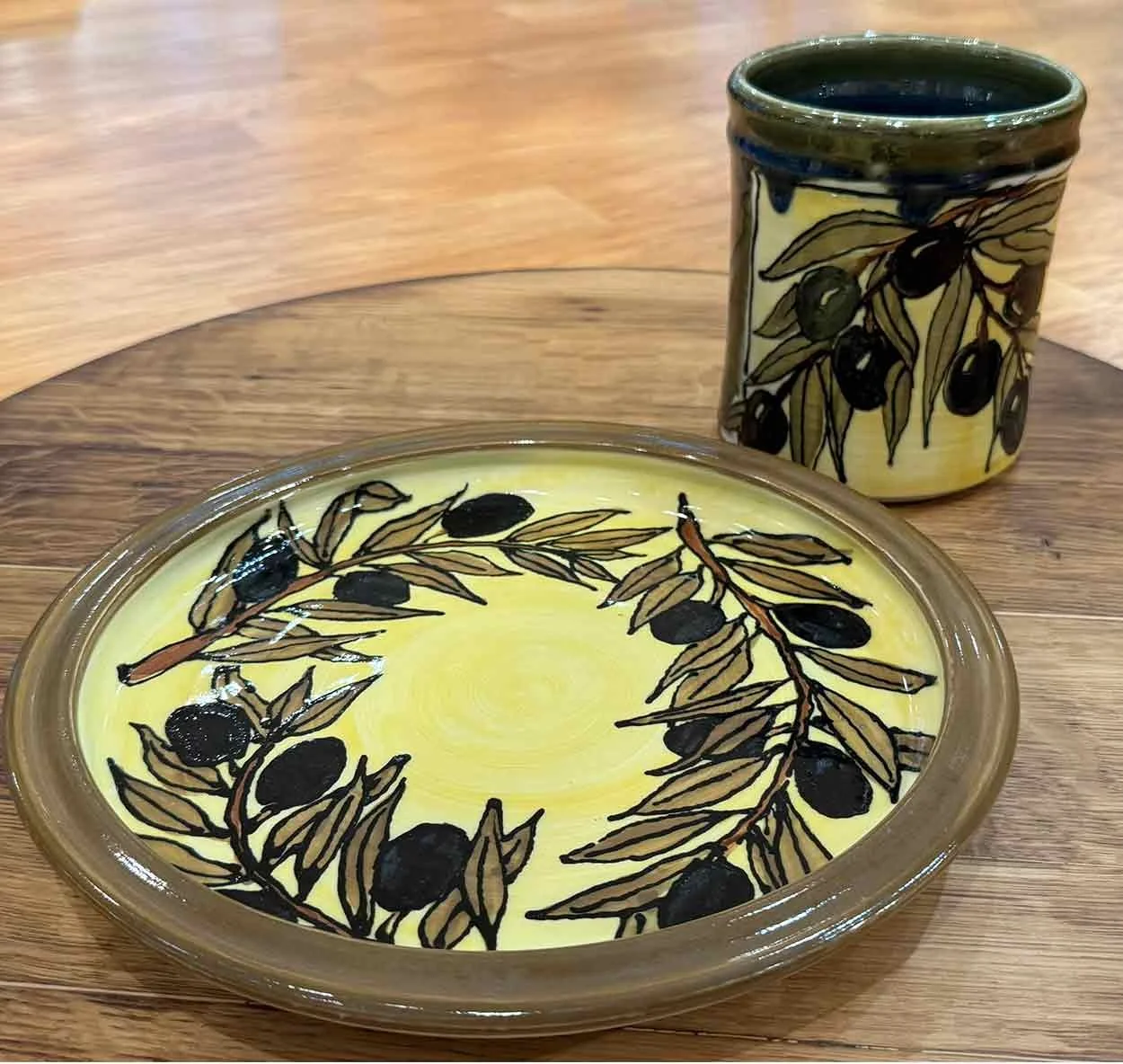 Wheel thrown, hand painted pottery by Lauren Peterson.