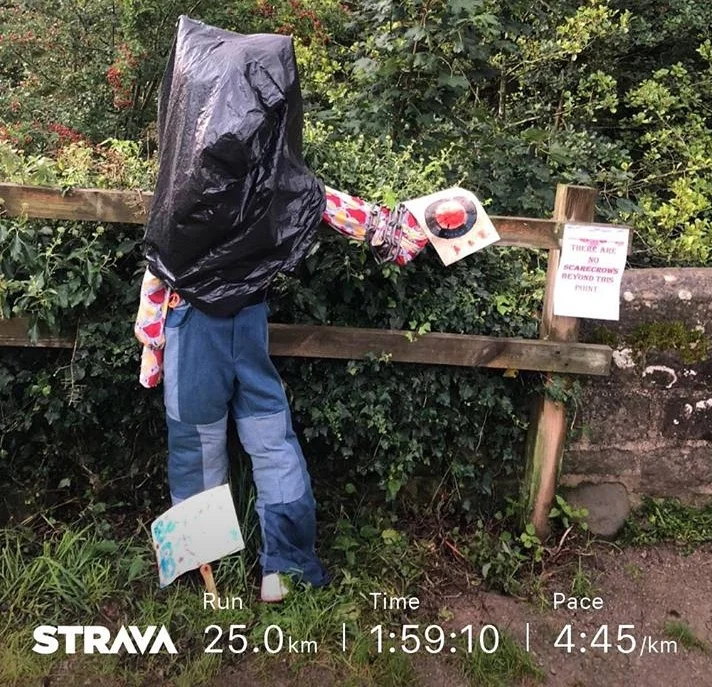 Scarecrow with a bin bag covering him head and details of my run - 25km in 2 hours - for JamesRunsFar.jpg