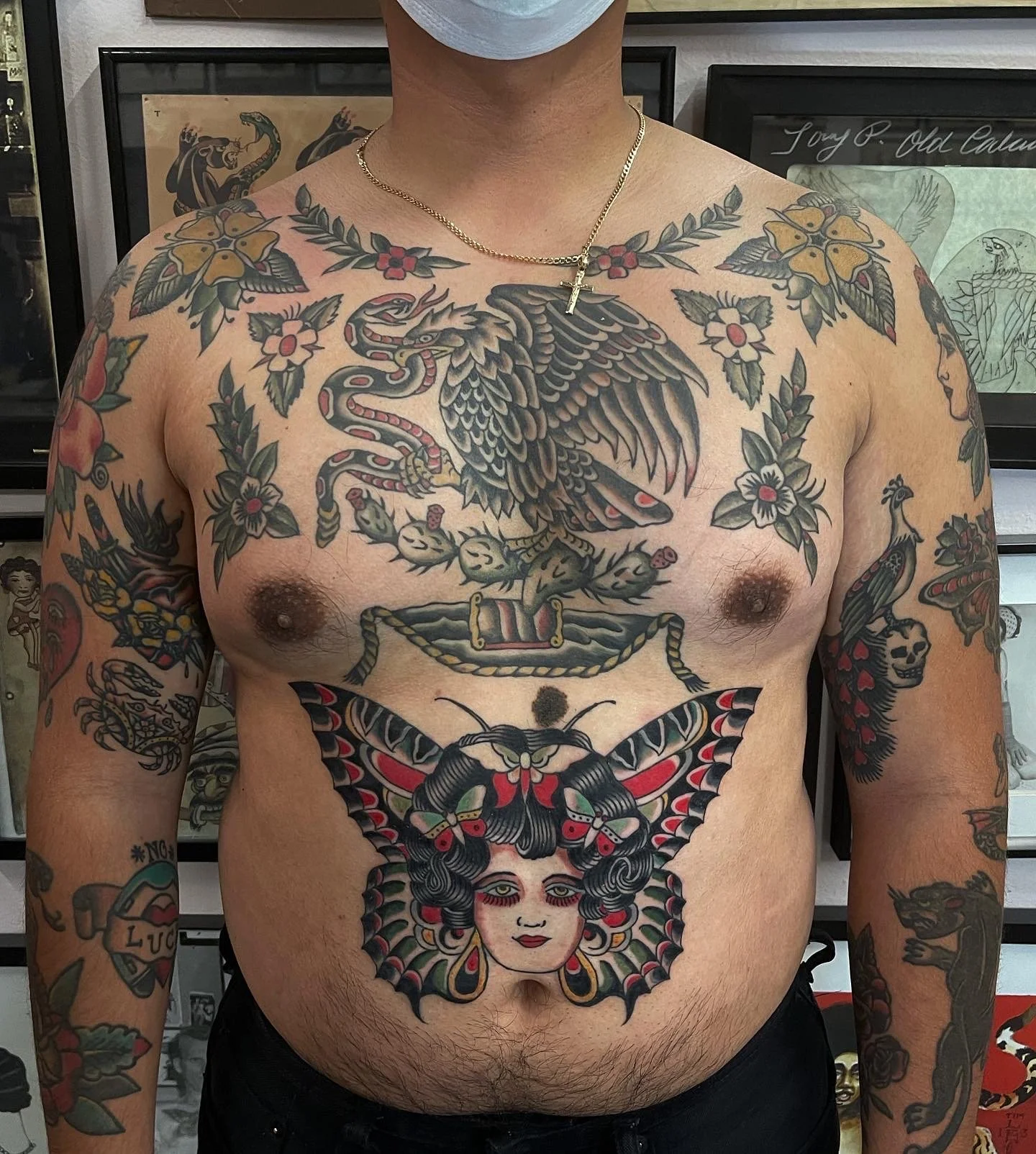  Stomach tattoo of girl head with butterfly head piece.  