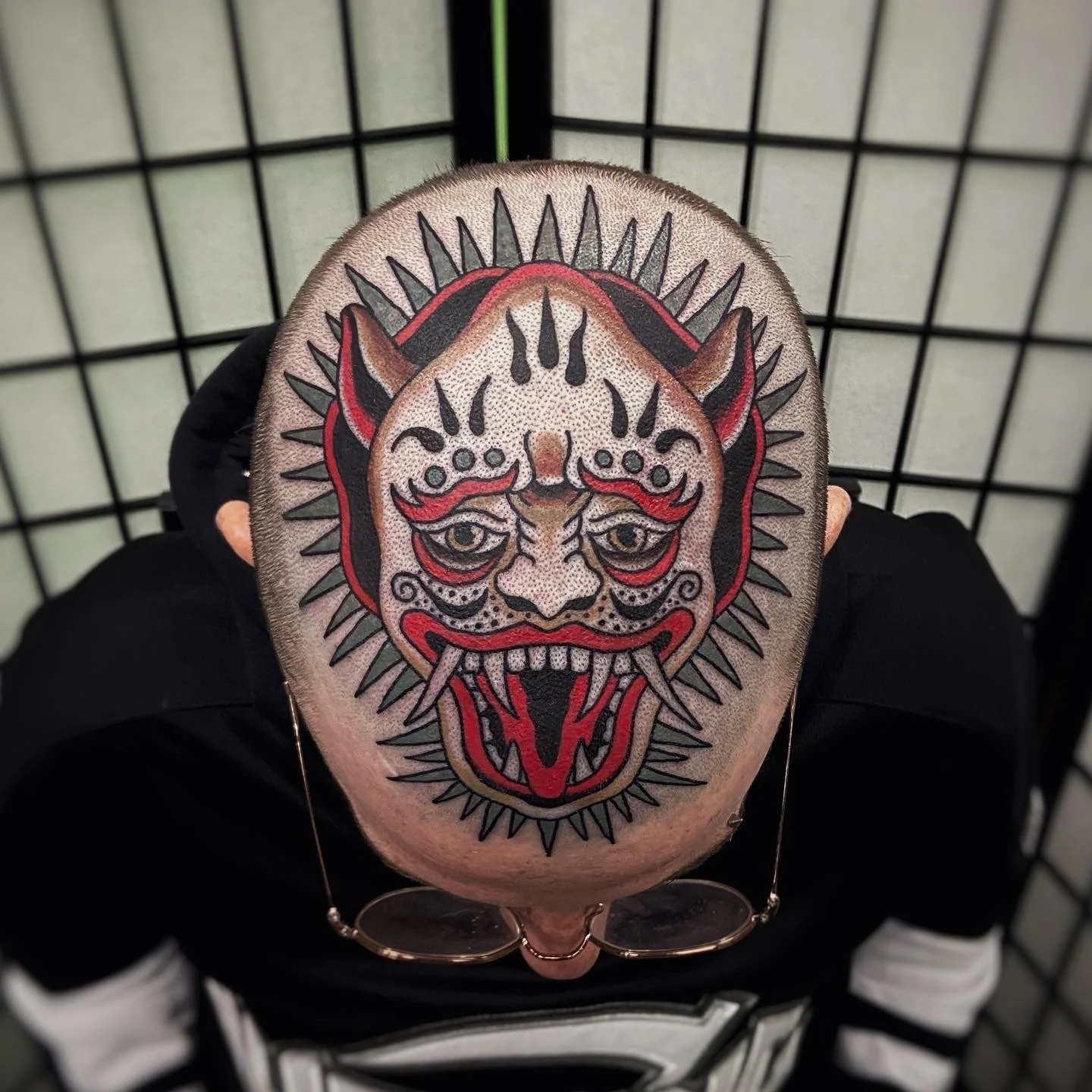 Tattoo of Japanese demon on skull