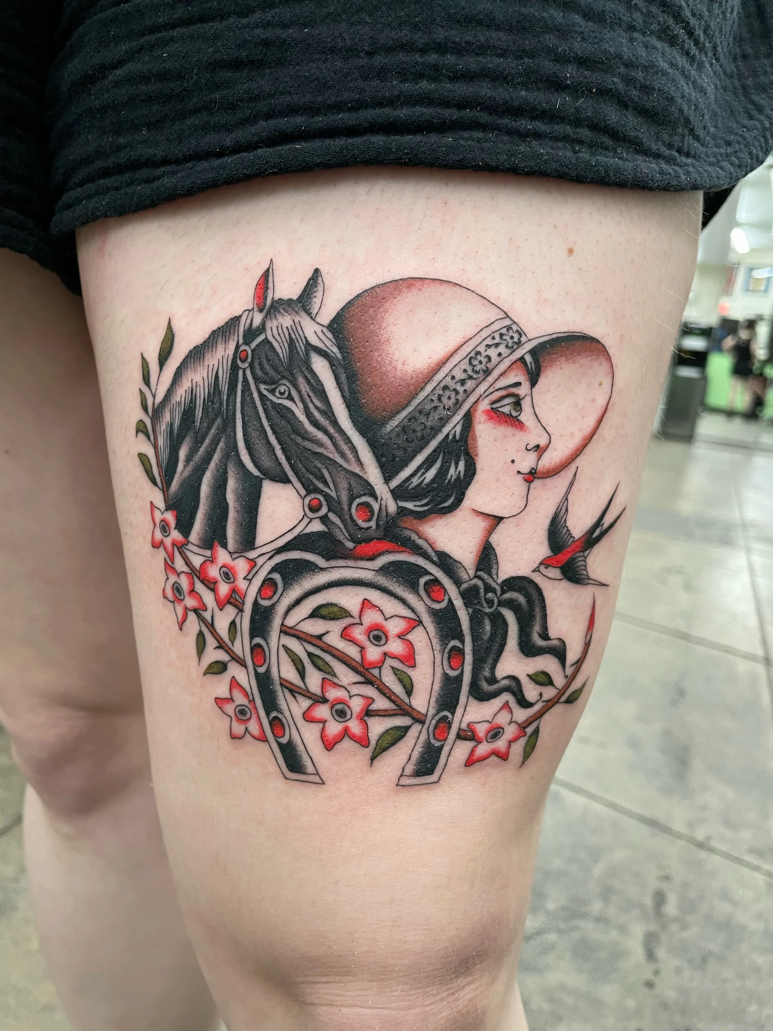 Tattoo oof girl head with horse head and flowers