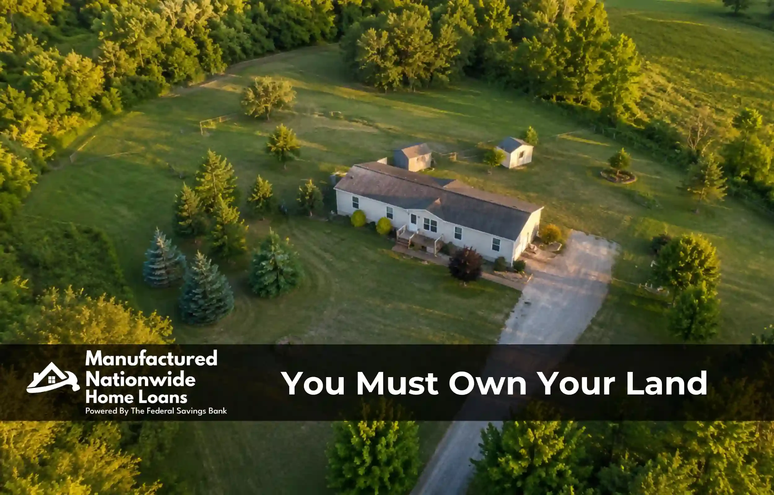 A manufactured home on privately owned, fenced land at dusk, illustrating the land ownership requirement for equity loans covered by Build Buy Refi Home Loans.