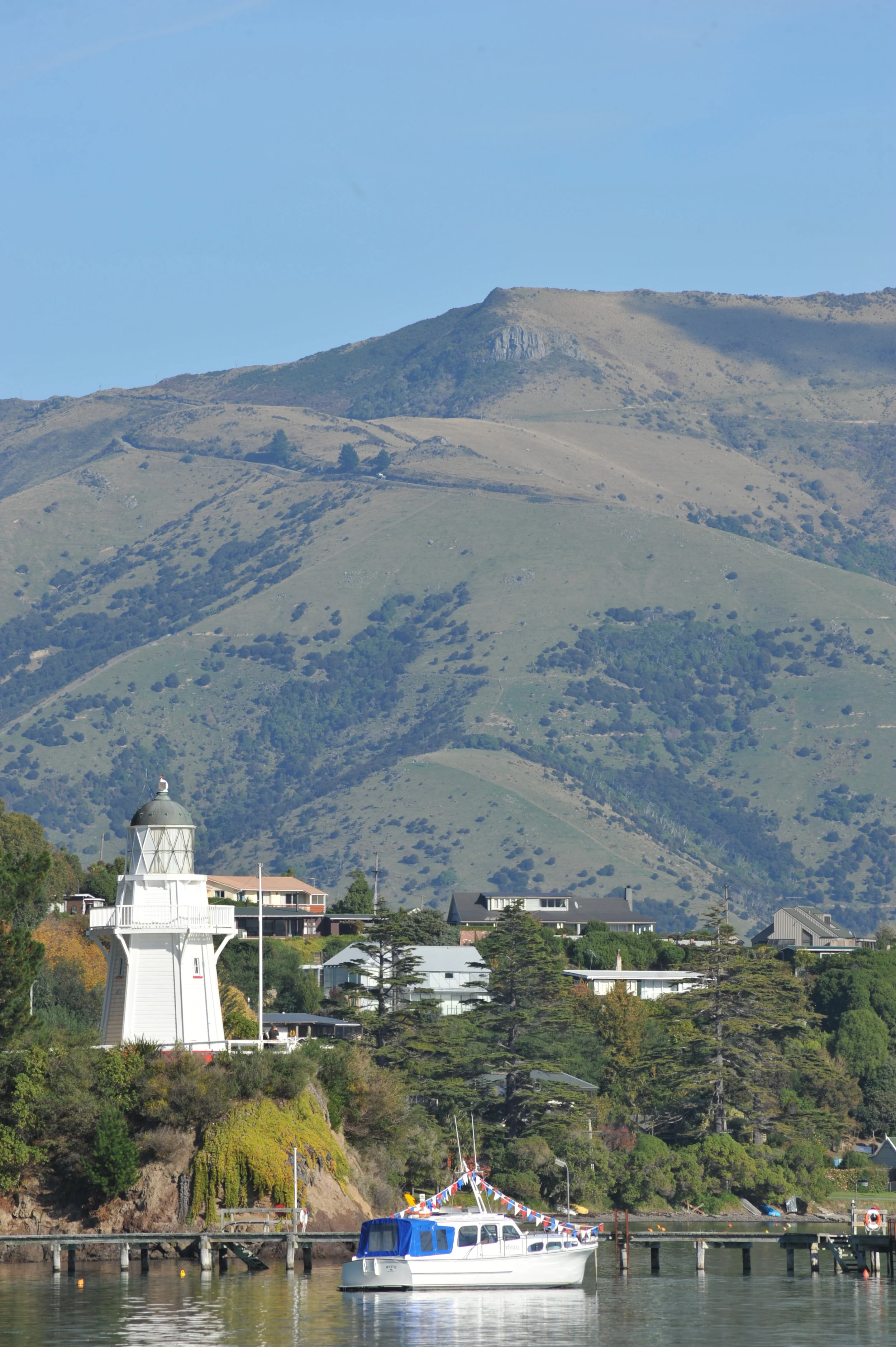       
  
    The small seaside town of Akaroa is the areas main hub. Akaroa means long harbour in Maori and the whole township essentially revolves around this. Back in 1838 Capt. Langlois provisionally purchased this area for the French only to ret