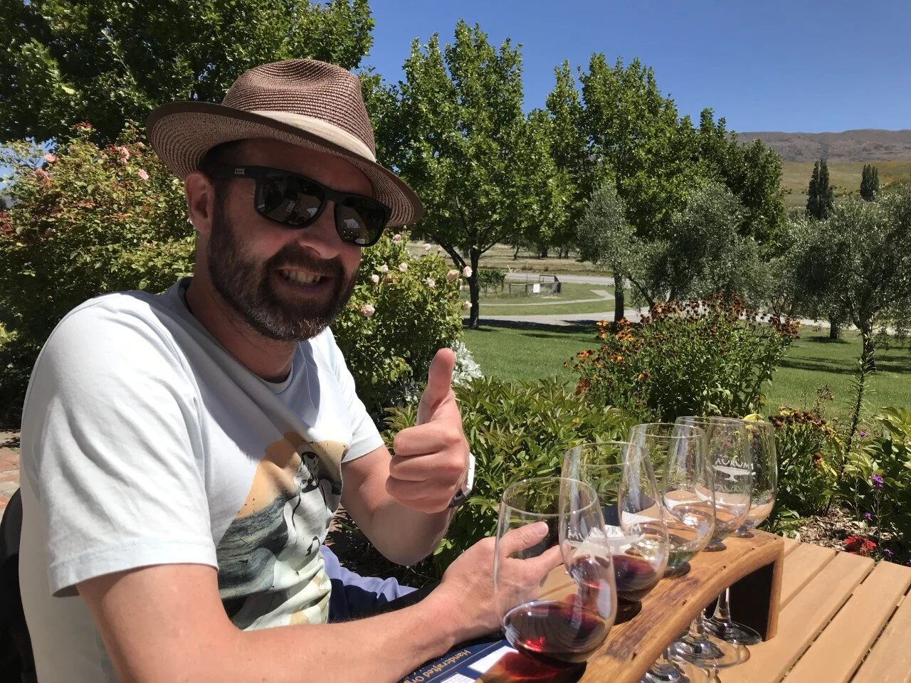 Dan enjoying a tasting at Aurum, overlooking the olive trees