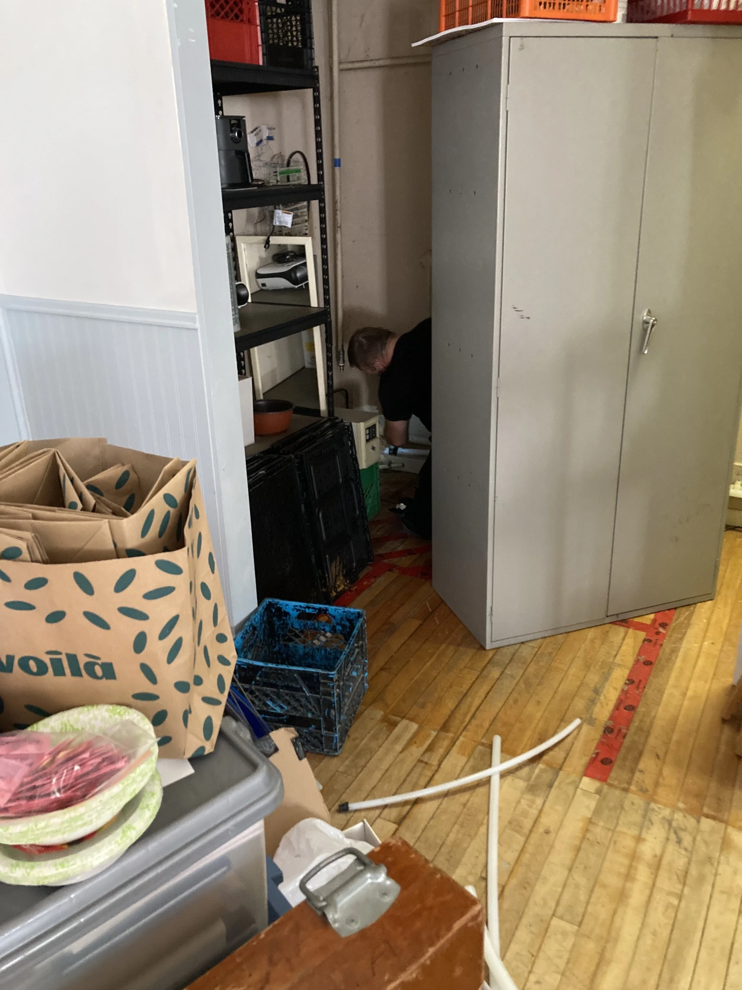 Aaron working in Celebration Hall closet.jpeg