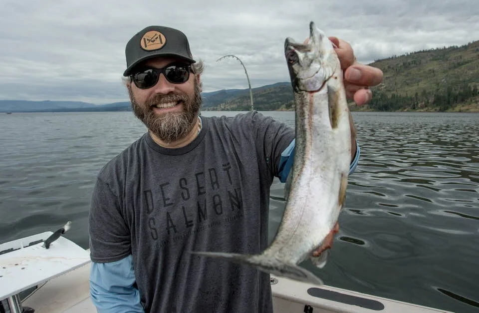 Nelson Jatel with sockeye salmon caught on Okanagan Lake fishing charter