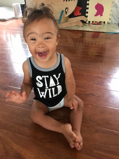 We have an amazing relationship with Grant's birth parents who live about an hour and a half north of us. So much so, that they face-timed us on March 21st, World Down syndrome day, and offered to be our egg donor!! We were shocked at how generous of an offer that was, especially after they had already made us first time parents by choosing us for Grant. After a couple months of thinking and talking about it, Scott and I took them up on their offer at the beginning of June. However, at 6.5 weeks pregnant, I miscarried both babies. Although we knew this was a very likely possibility, it was still very disappointing and sad for us. My doctor suggested I have a surgery before she does another transfer. We are hopeful and excited about trying again, and even though our story is incredibly unique, we also think it's quite amazing that Grant could possibly grow up with biological half siblings. We are loving every single day with Grant and the amount of joy he brings us is immeasurable! What an absolute cutie he is.