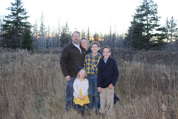 katerina whole family in the feild.png