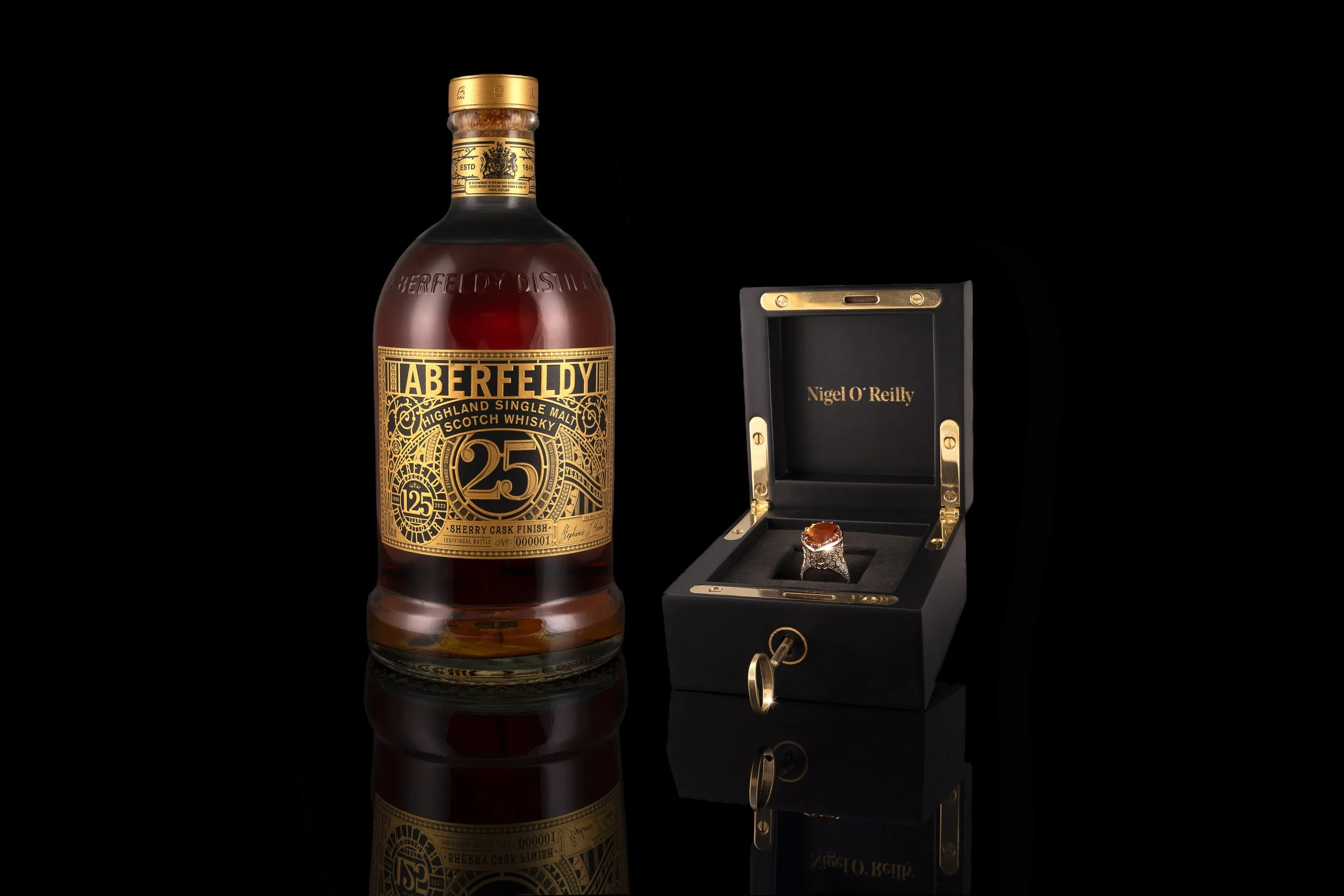 ABERFELDY Whisky Bottle pictured with Highland Honeycomb Ring created by Nigel O'Reilly Goldsmith, Ireland