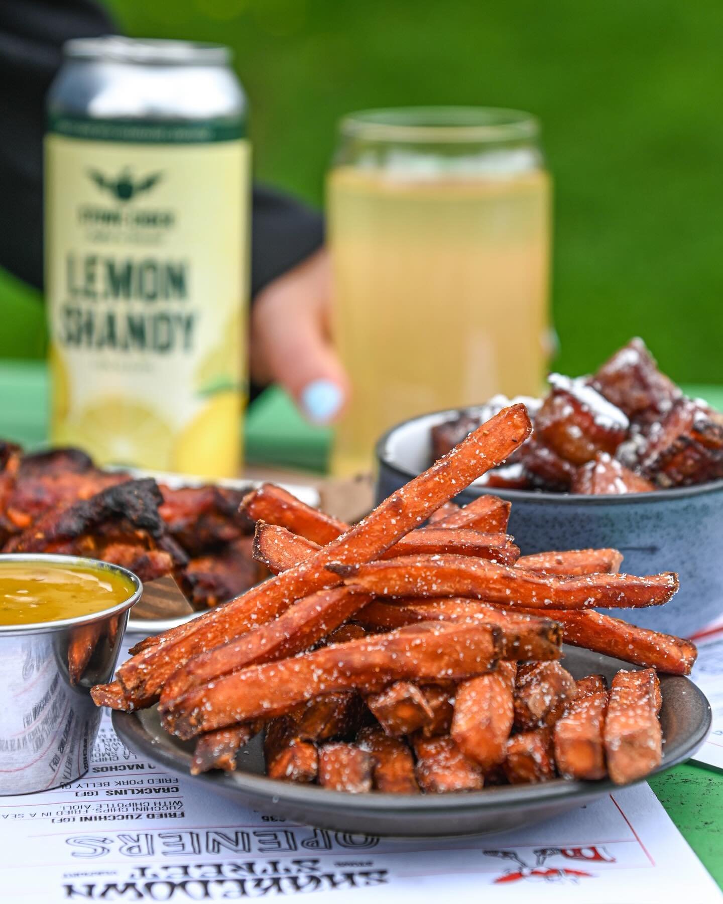 Lemon Shandy &amp; sweet potato fries?! Yum is an understatement ☀️☀️

Did you know we have a full bar &amp; dining menu at our taproom in Stowe? We offer delicious smoked BBQ, sandwiches, salads, specialty cocktails &amp; more.

Follow our restauran