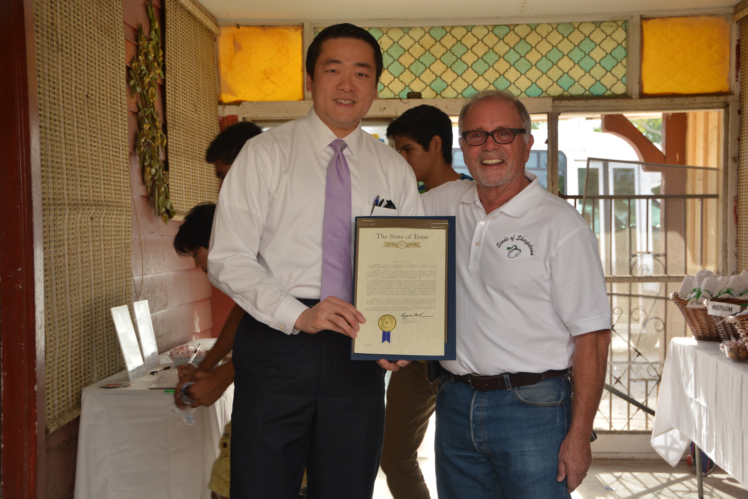   Gene Wu presents Seeds of Sharpstpown’s Michael Prentice with a proclamation from the State of Texas House during the Remnants of the Past, Visions of the Future reception.  