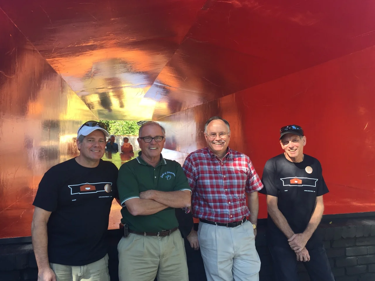 Artist Dean Ruck, Seeds of Sharpstown founder Michael Prentice, Houston City Councilman Mike Laster and artist Dan Havel standing in front of Havel Ruck Project's "Sharp."
