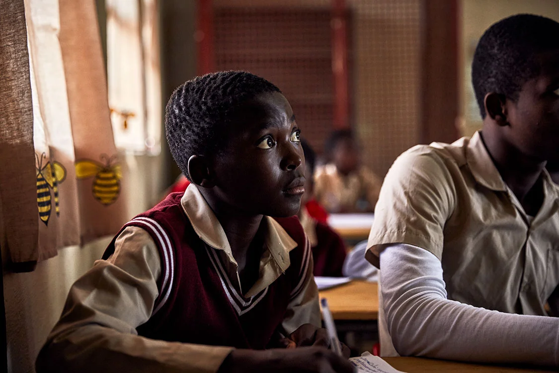 A student listens intently, Mhala Mhala Primary School, South Africa, 2017.