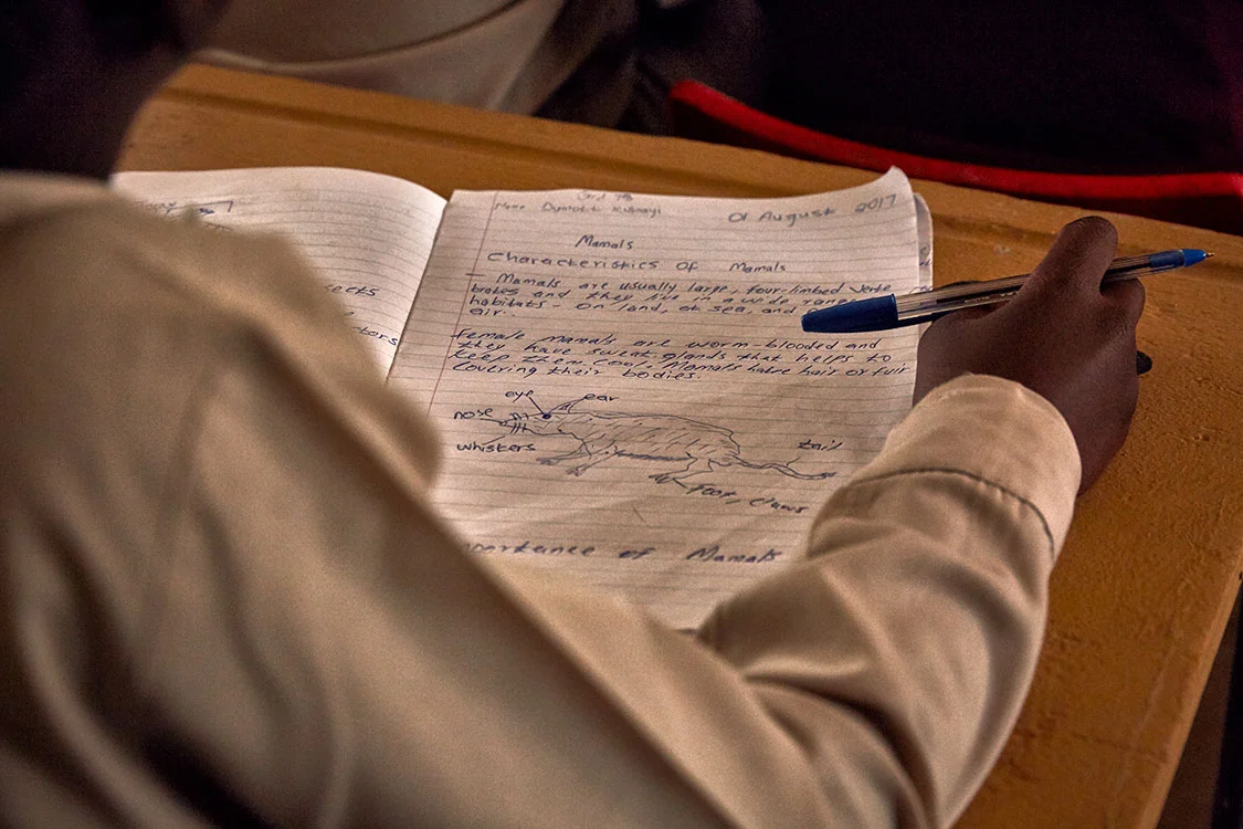A student’s notebook during a class about mammals, Mhala Mhala Primary School, South Africa, 2017.