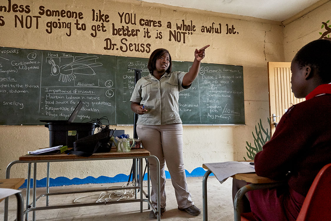  Bush Babies education officer Lewyn Maefala stands in front of the class, Mhala Mhala Primary School, South Africa, 2017. 