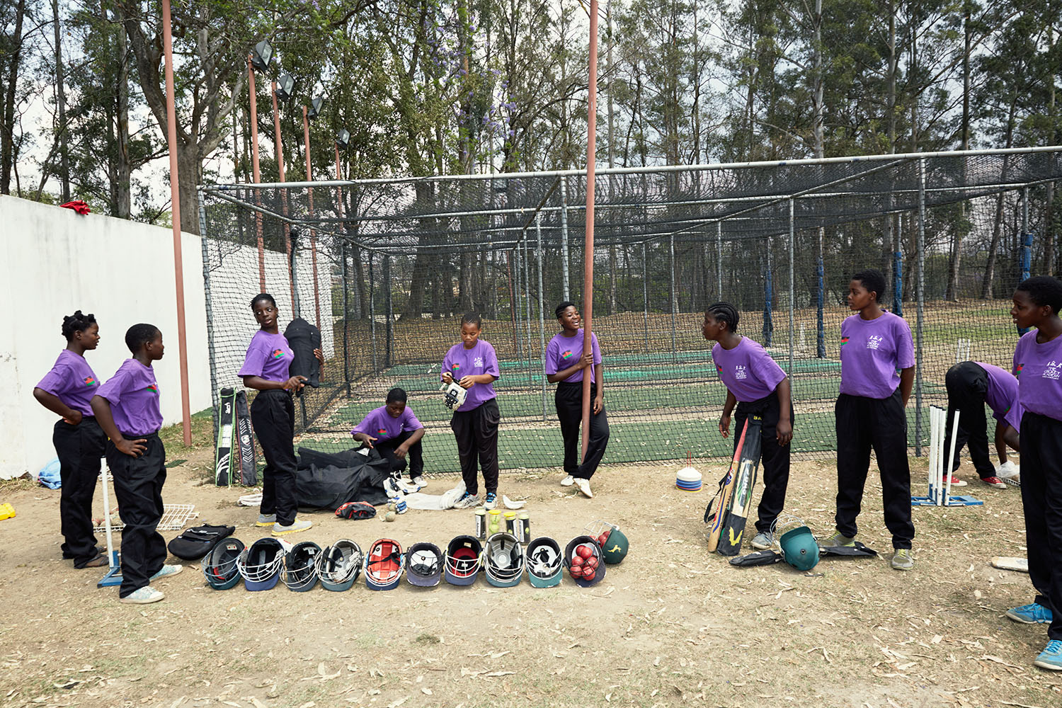 The girls pack away their kits after training