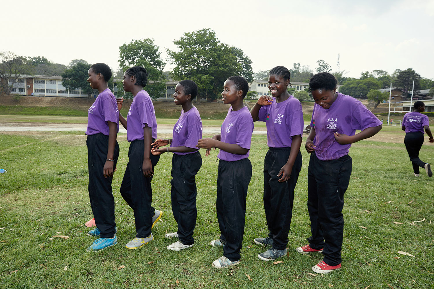 Girls line up for their turn during training