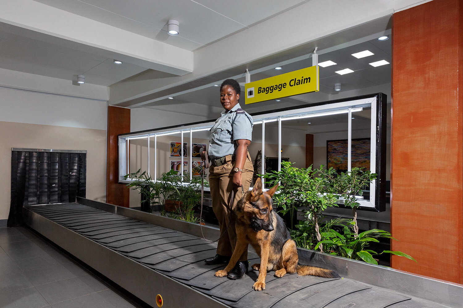  WDDU handler Agnes and dog Max, Kamuzu International Airport, Malawi, 2020. 