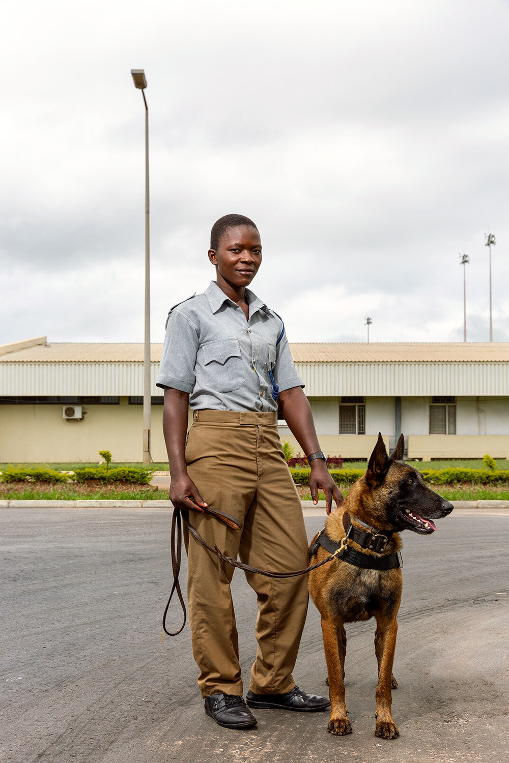  WDDU Martha, and dog Tim, Kamuzu International Airport (KIA), Lilongwe, Malawi, 2020. 