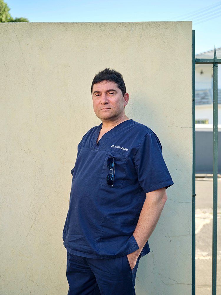  Dr Kevin Adams, photographed outside his office, Claremont, Cape Town, 2022.   In 2009, after Dr. Adams founded the Transgender Clinic — a new transgender care project at Groote Schuur — things became more structured. Led by Dr. Adams — a senior spe
