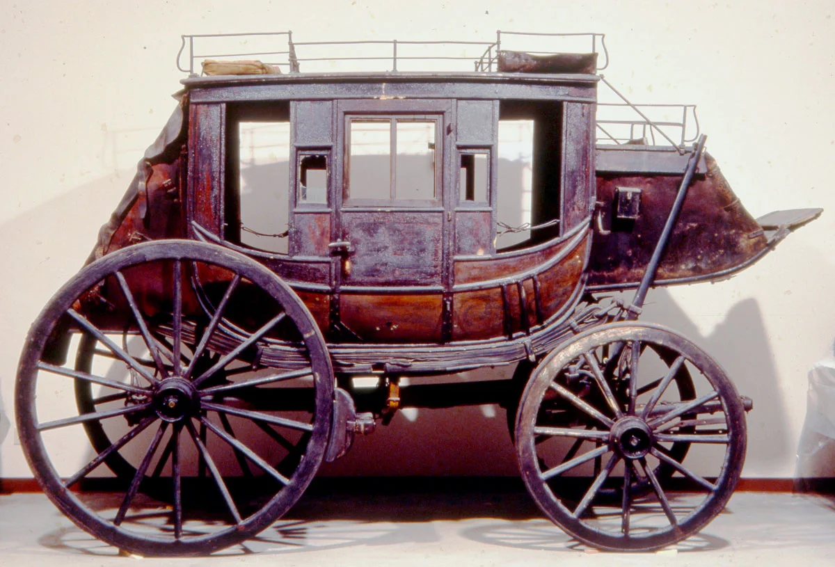 Before: stagecoach with layers of varnish
