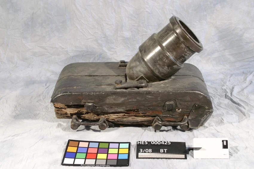 Before: coehorn mortar with damaged base