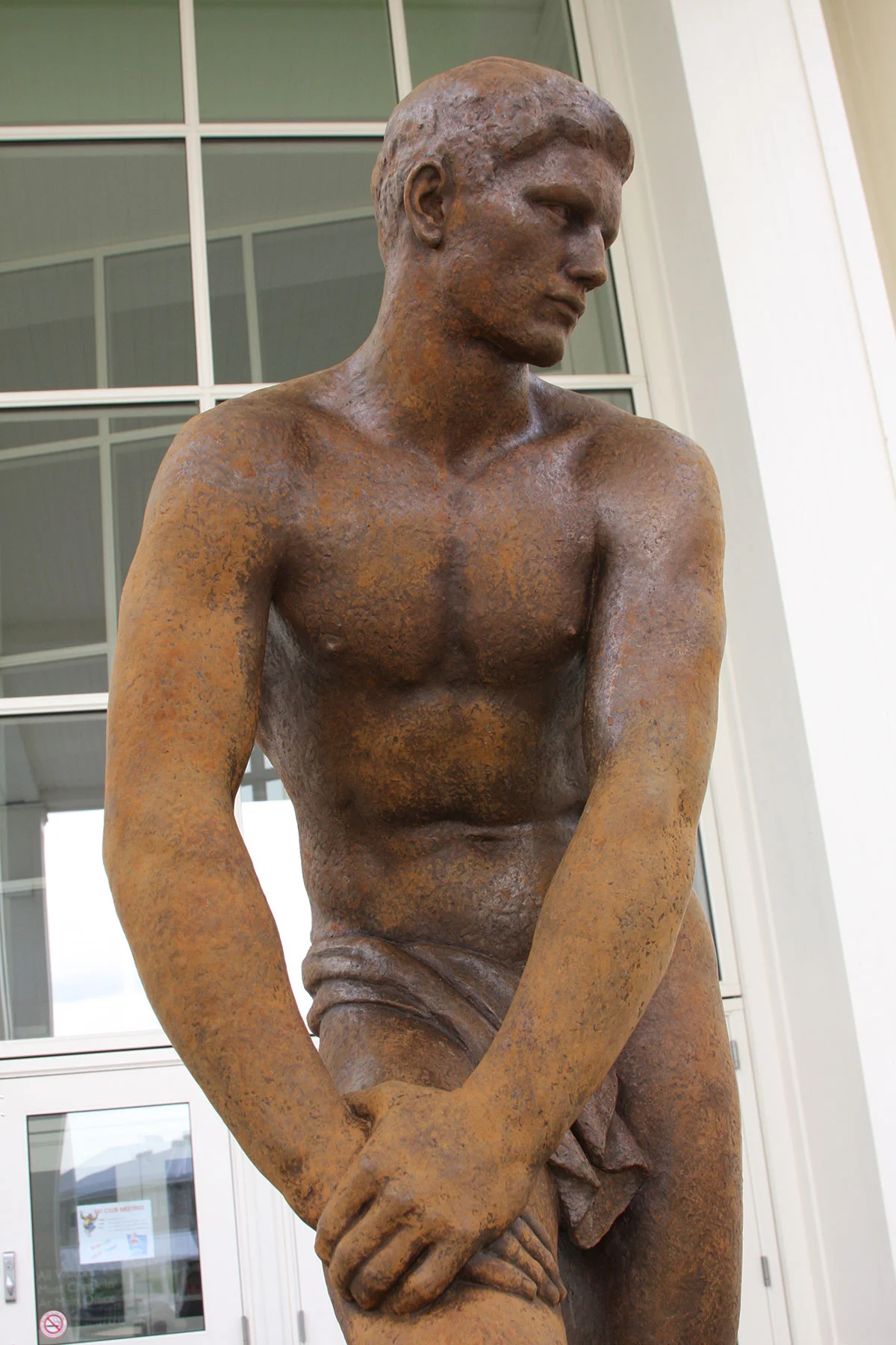 Before: bronze sculpture with patination damage