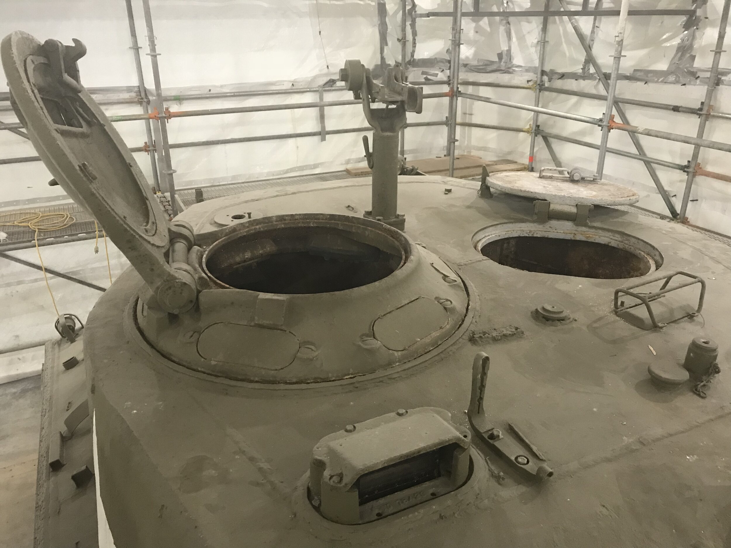 Welded plates on turret hatch