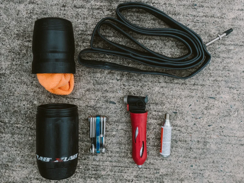 XLAB Gear Pod: “I’ve never liked a dangling saddlebag, so instead I carry a water-bottle-style tool holder.” $9.95