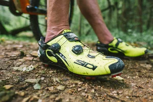 SIDI Shoes “Notice the bright yellow SIDI shoes. These shoes fit me perfectly, and, because they are constantly rotating, they are a great safety device. I have ridden for over 35 years, and safety is always my first priority. Being cool is not as important as being seen. Even when I ride gravel or the trails, I like brightly colored clothes, shoes and helmet. The ORBEA Alma bike is bright orange with neon green letters.” Starting at $139.00