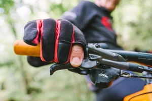 The Gloves “I don’t wear gloves when riding the road but I always do on gravel or the trails. I like full-fingered gloves. I cut the tip off the index finger on the right glove so I can have more sensitivity when braking/steering and if I need to use the phone a sweaty glove is very hard to get off.” Price varies.