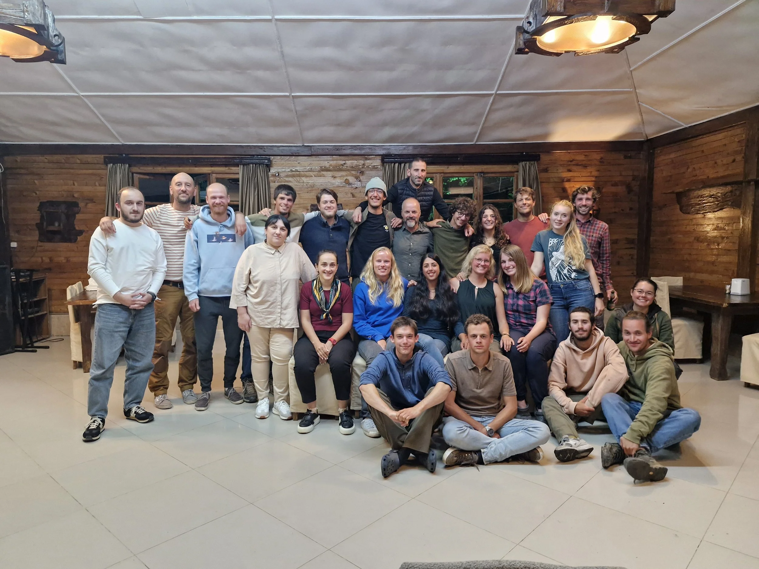 Group picture after our final, well-deserved dinner, with many toasts to an unforgettable season.