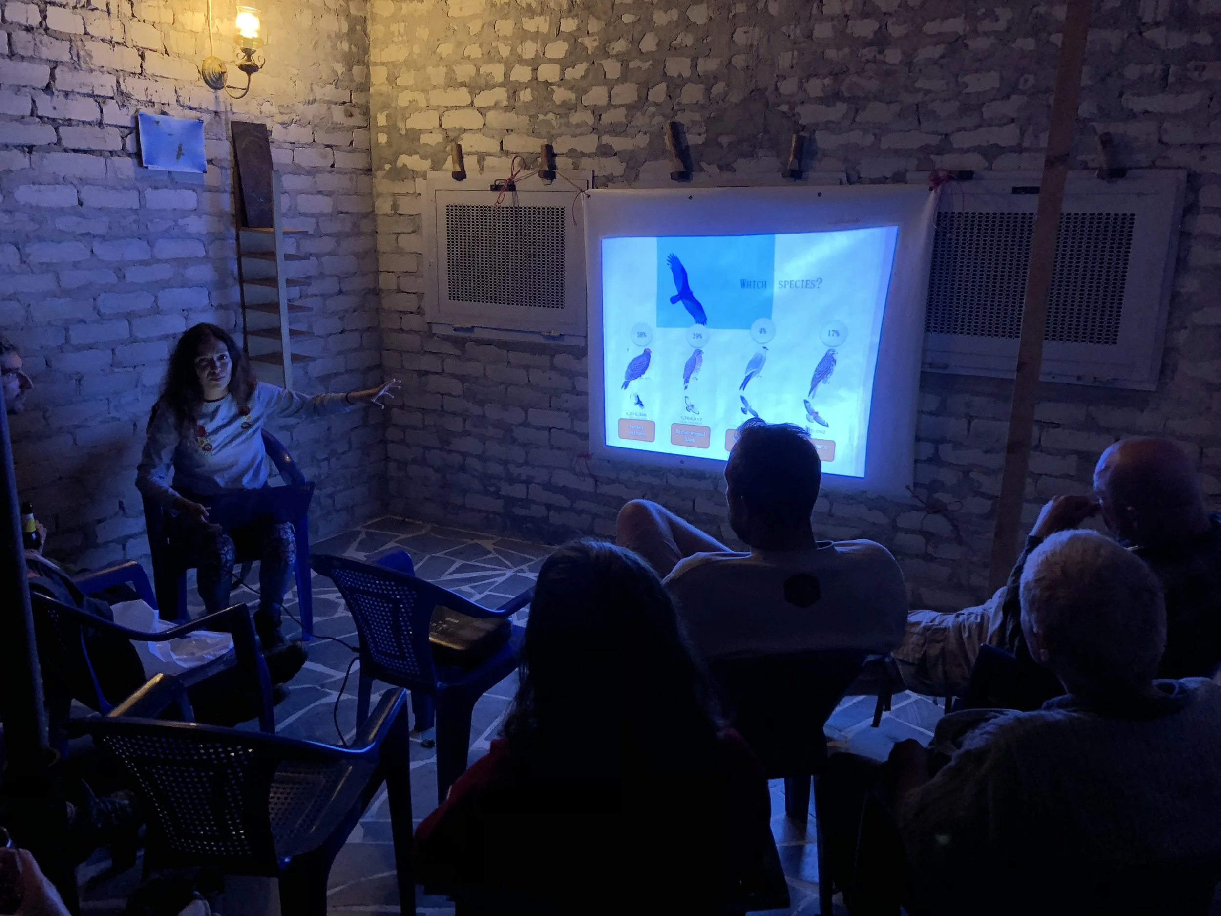 Evening presentations by our long-term counter Paulina about raptor migration in Mexico. Photo by Bart Hoekstra.
