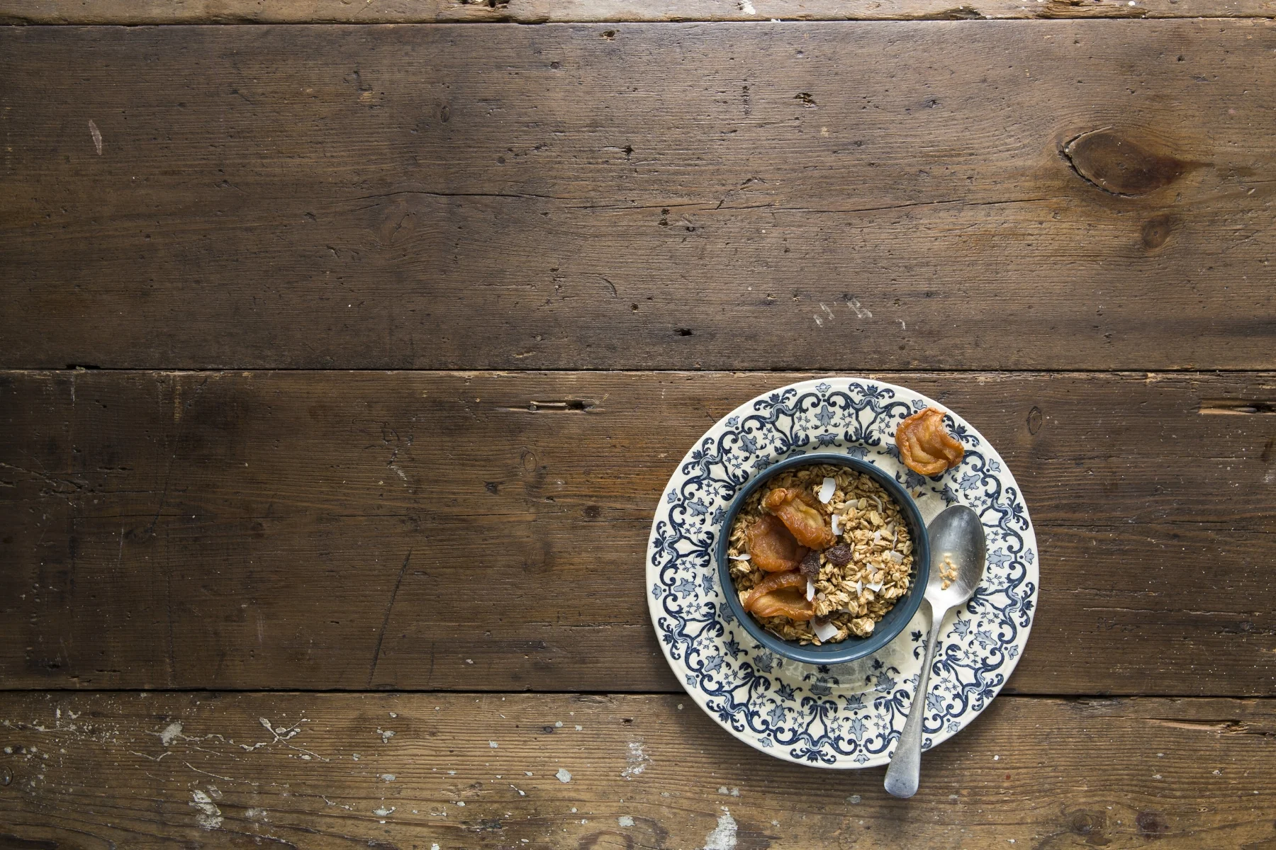 2. I like the layering of these two plates (see the prop image) and instinctively I’ve placed it on the rule of thirds bottom horizon line. I dressed the granola with dried pears. Love their shape and how they create interesting shadows.