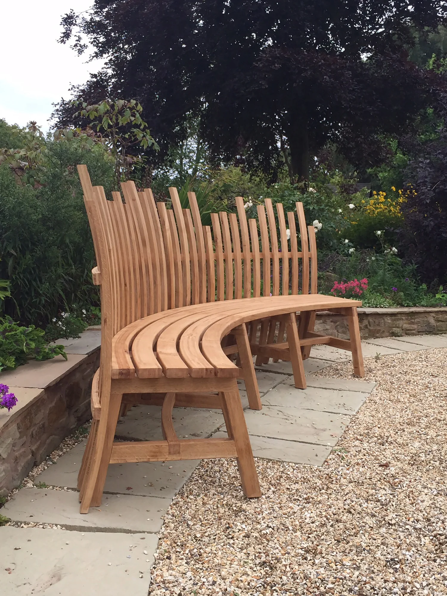 Cooke and Co Oak Garden Bench side view.JPG