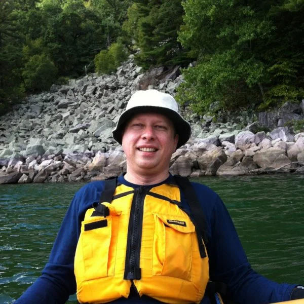 Frank in the back seat of our tandem kayak