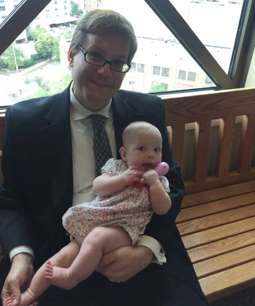 Relaxing at the courthouse with her dad