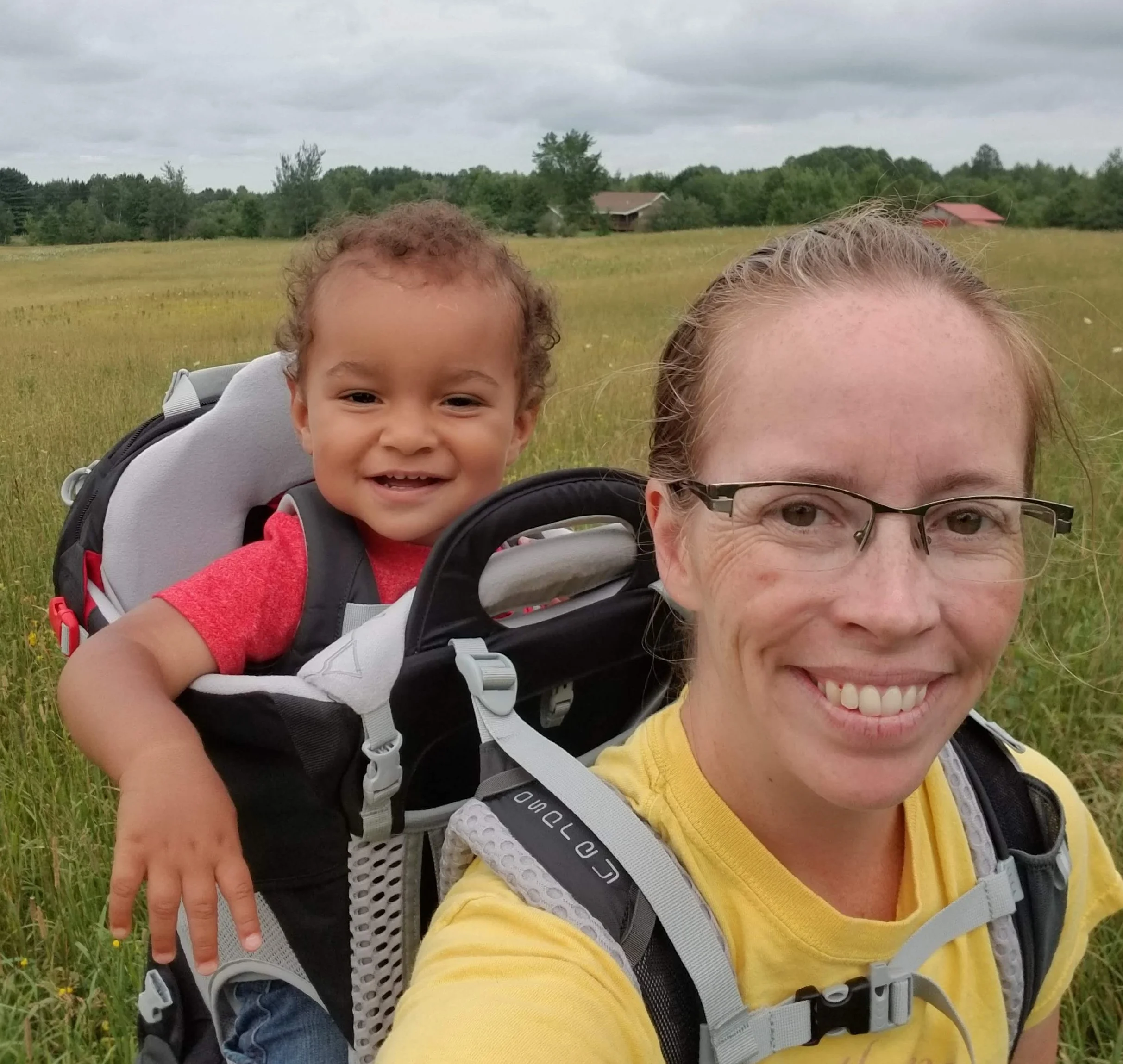 lauren and leo out for a hike on our land