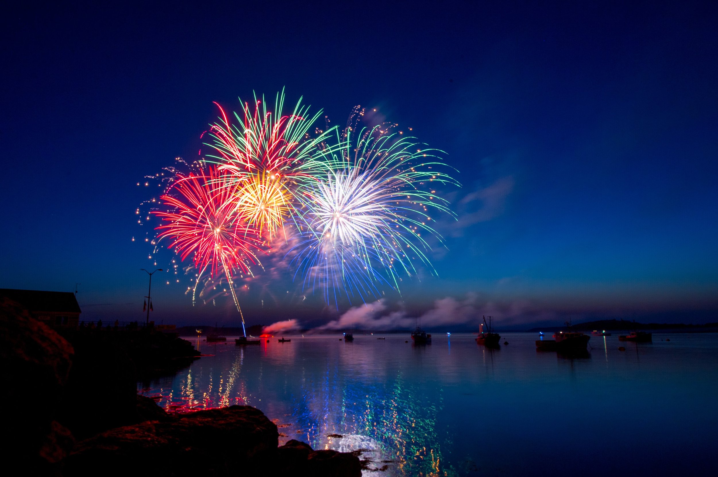 Fireworks over a bay