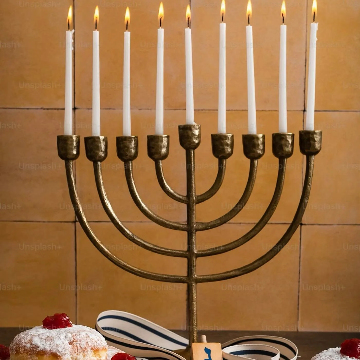 Growing up in New York City, #Hanukkah was never something that lived quietly in the background. It was everywhere&mdash;in glowing menorahs tucked into apartment windows, in bodegas wishing neighbors Happy Hanukkah, in classrooms, delis, sidewalks, 