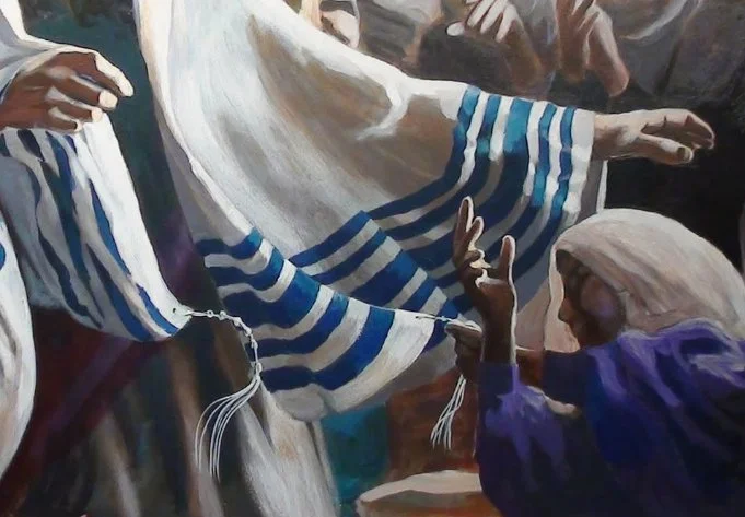 Holding On to His Garment