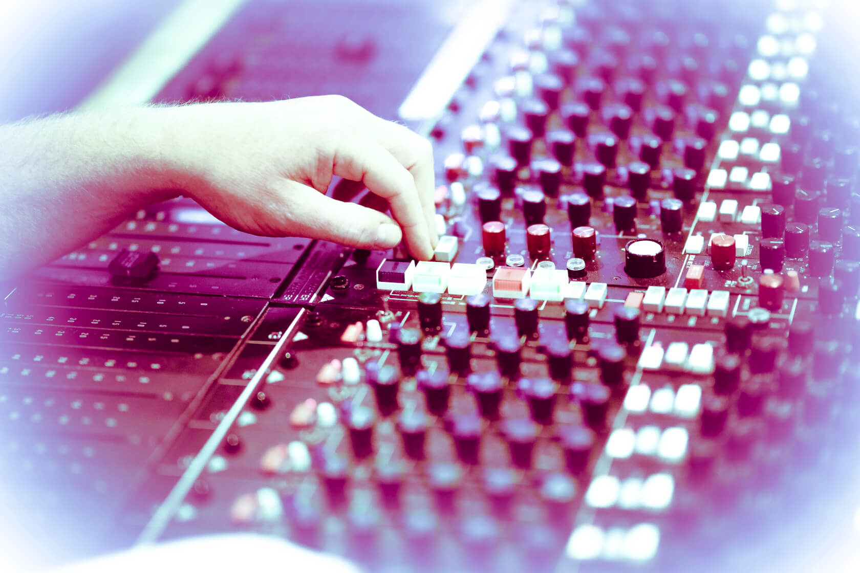 hand-on-mixing-desk-director-close-up-faders-what-a-voice-©IanWallman.jpg