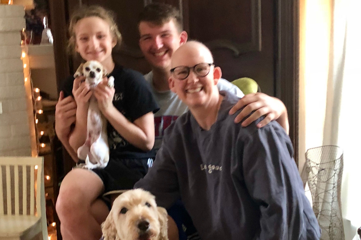 Emily with her family, after starting chemotherapy treatment for breast cancer.