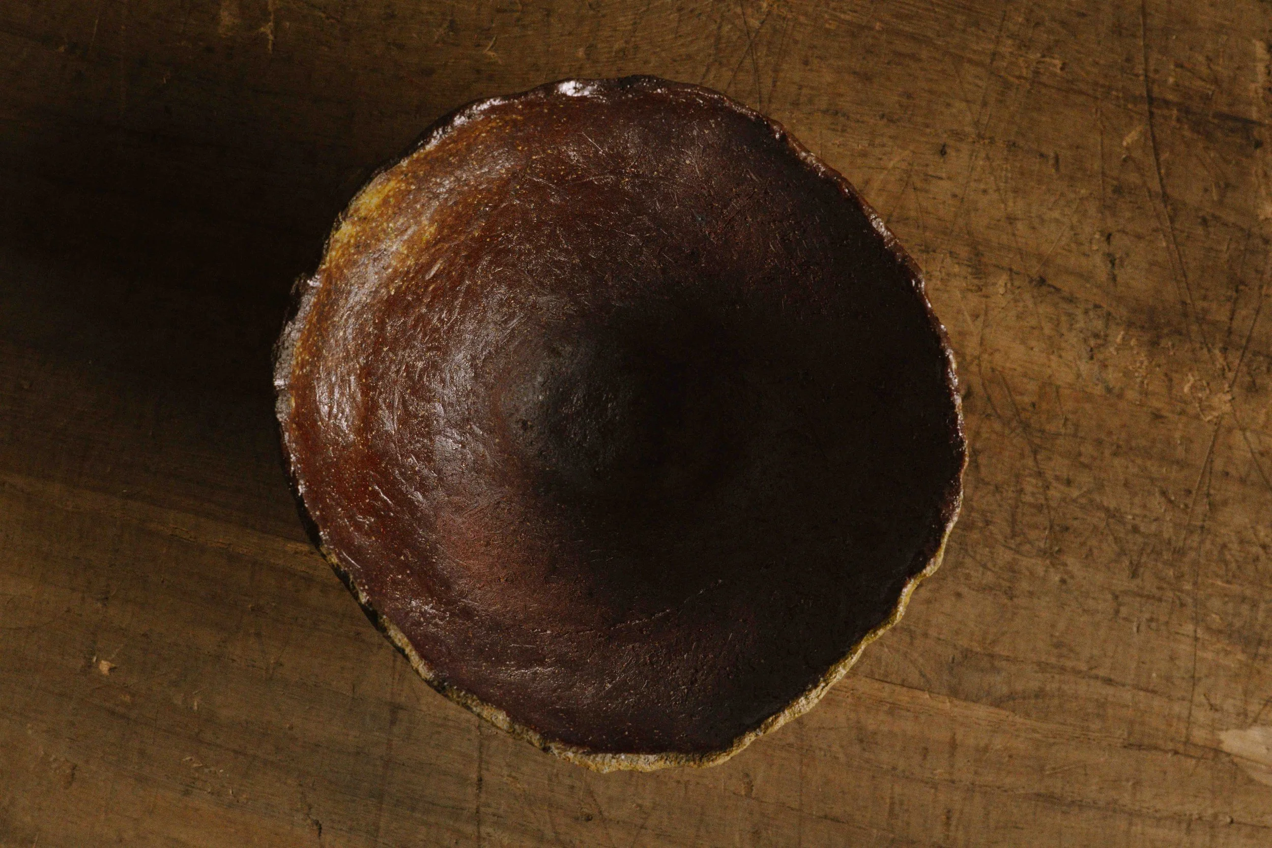 unglazed bowl, red clay body
