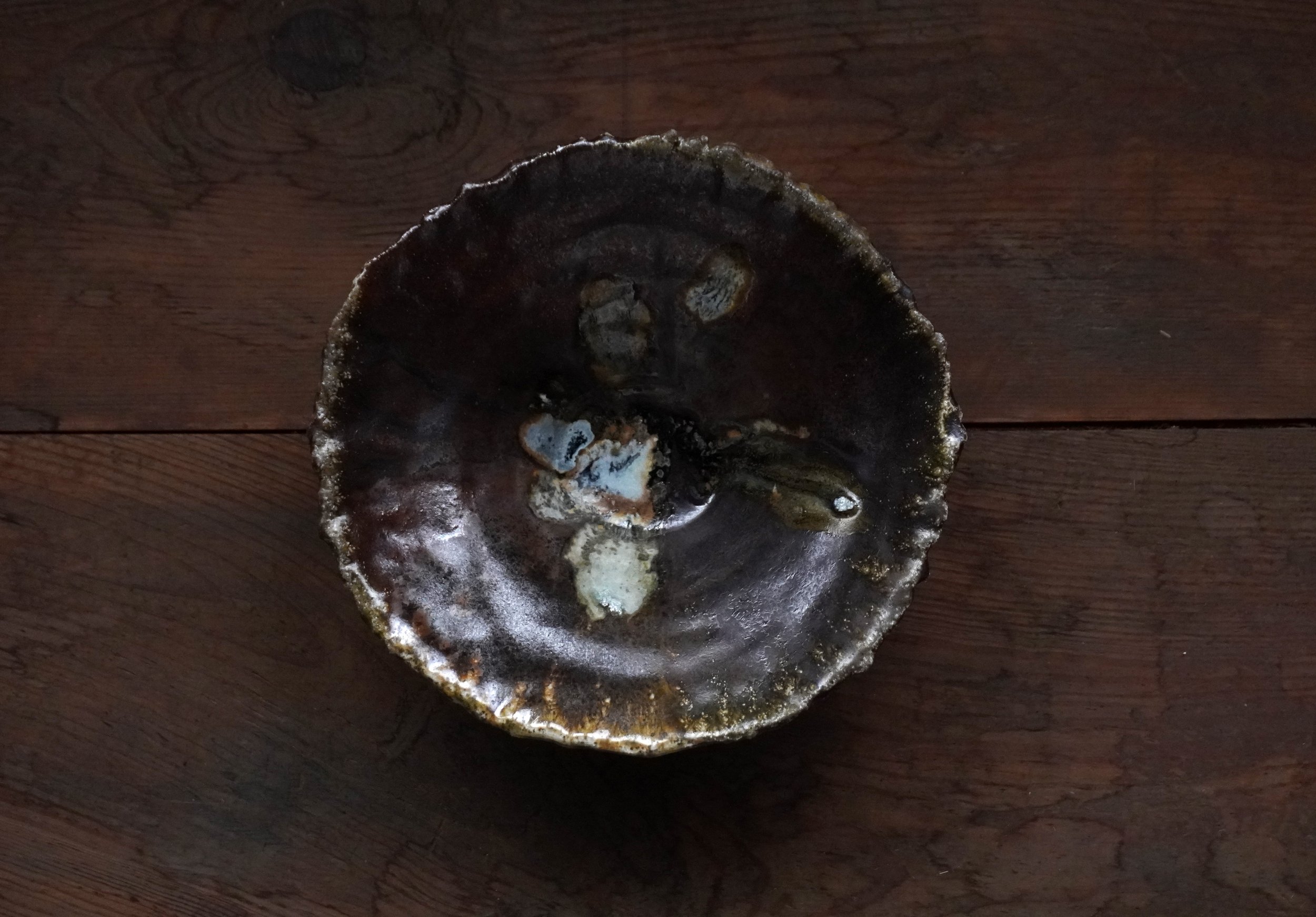 shinola glaze, kiln shelf drippings, red clay body