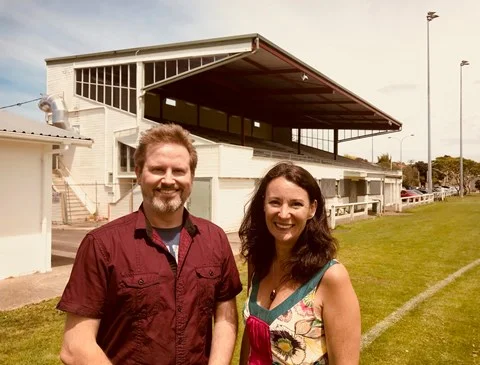 John Gillon and Danielle Grant in front of the old grandstand at Birkenhead War Memorial Park