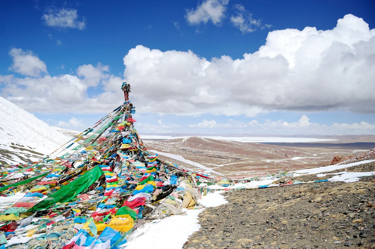 Holy-Prayer-Flag-at-the-Lakenla,-Tibet,-China-185595639_1256x836.jpeg