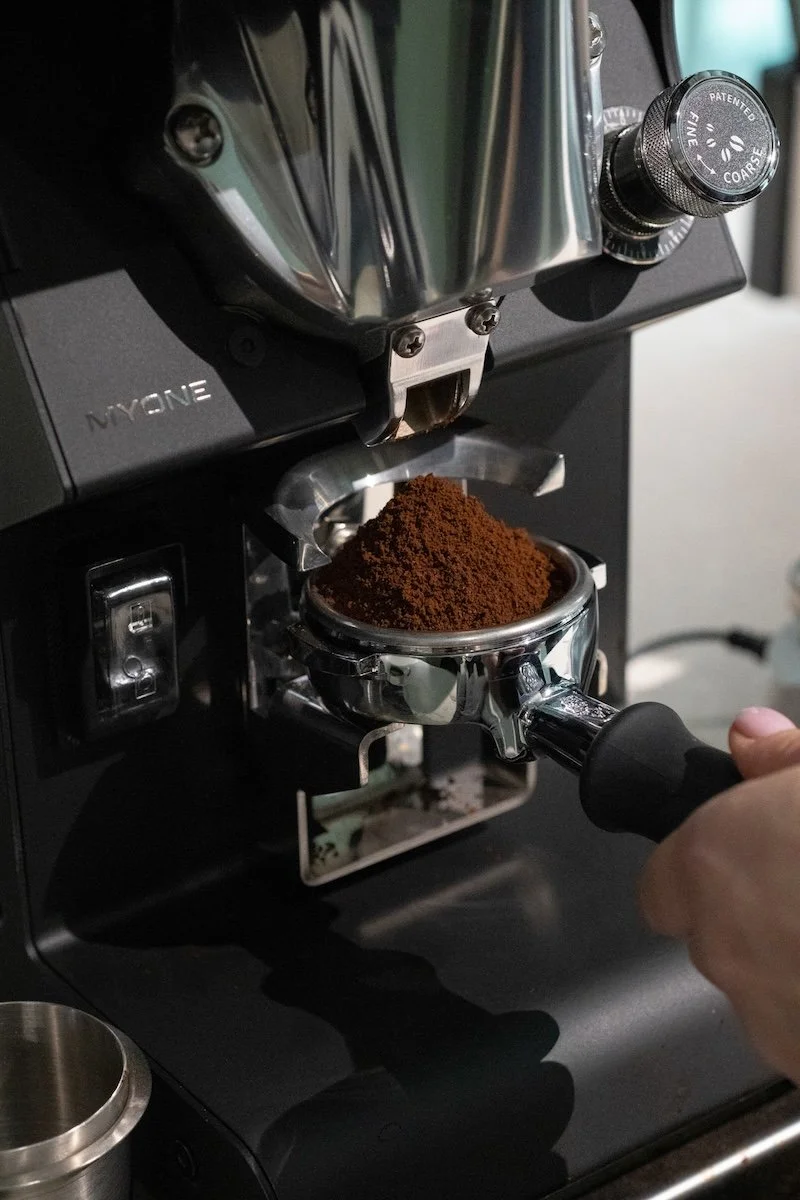 Freshly ground espresso grinds ready for extraction