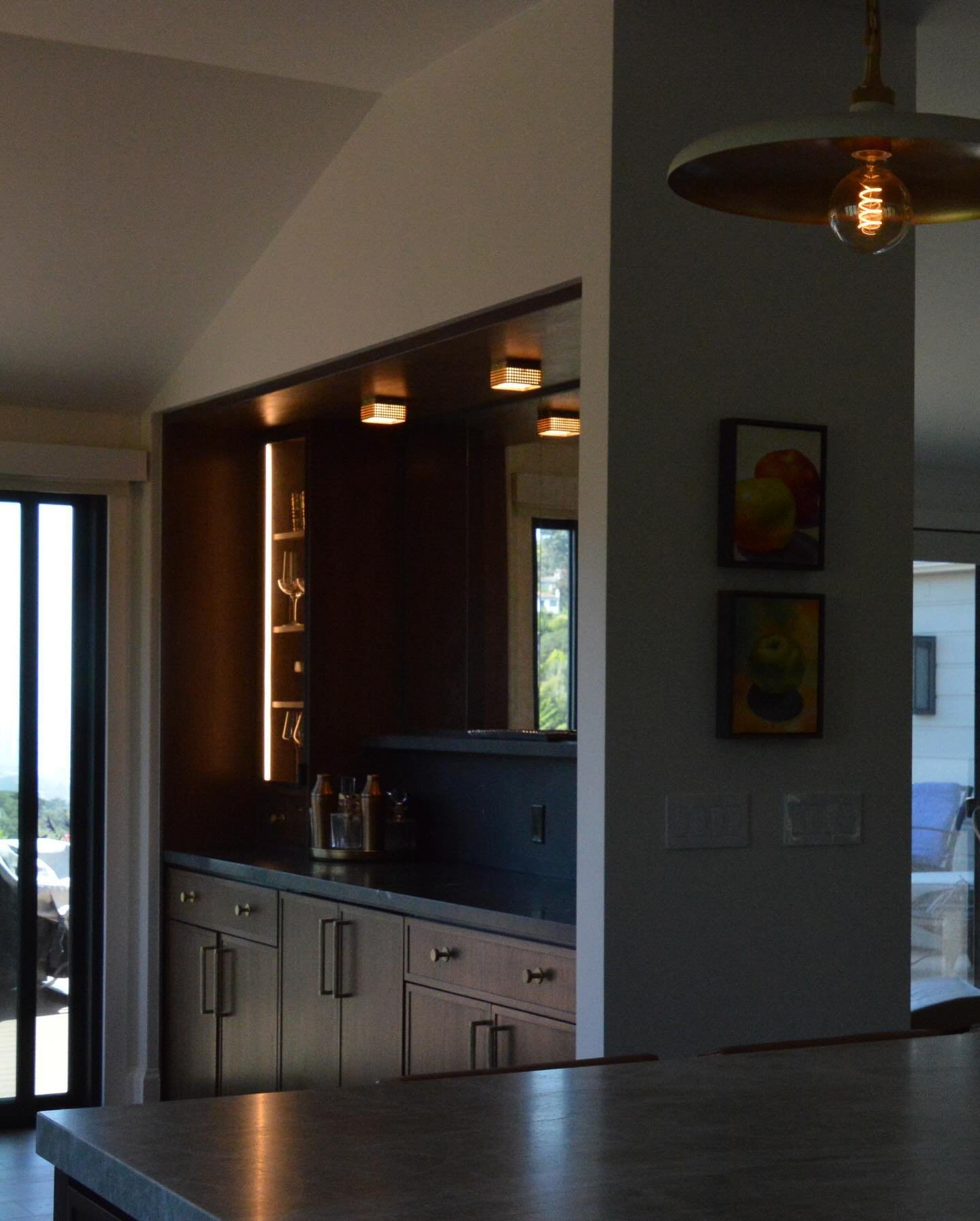 Somerset Home: the moody Bar with antique glass and glowing lights adds depth in the Kitchen Nook addition 🍂 #sunnyhillsstudio